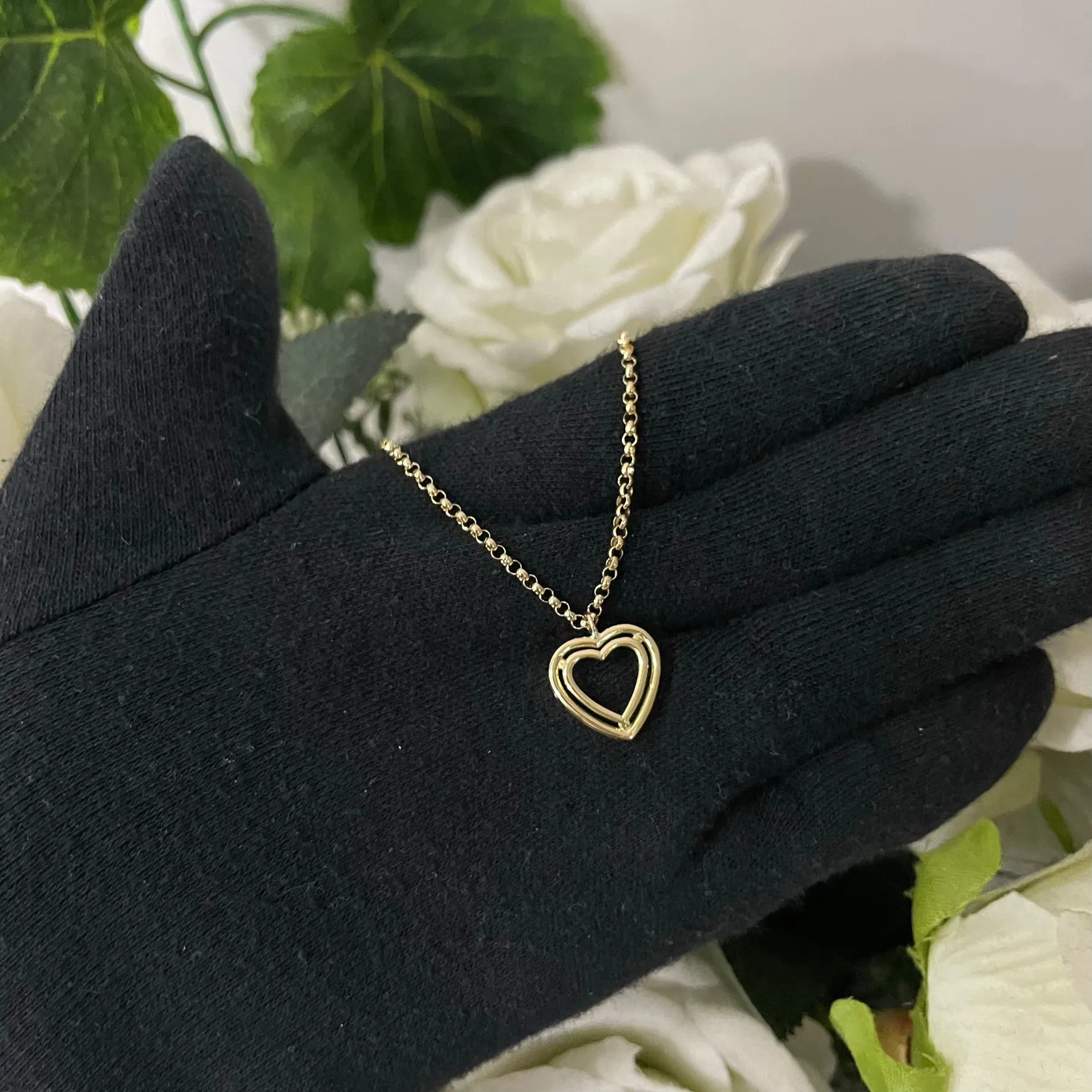 Collana rollò con cuore forato oro