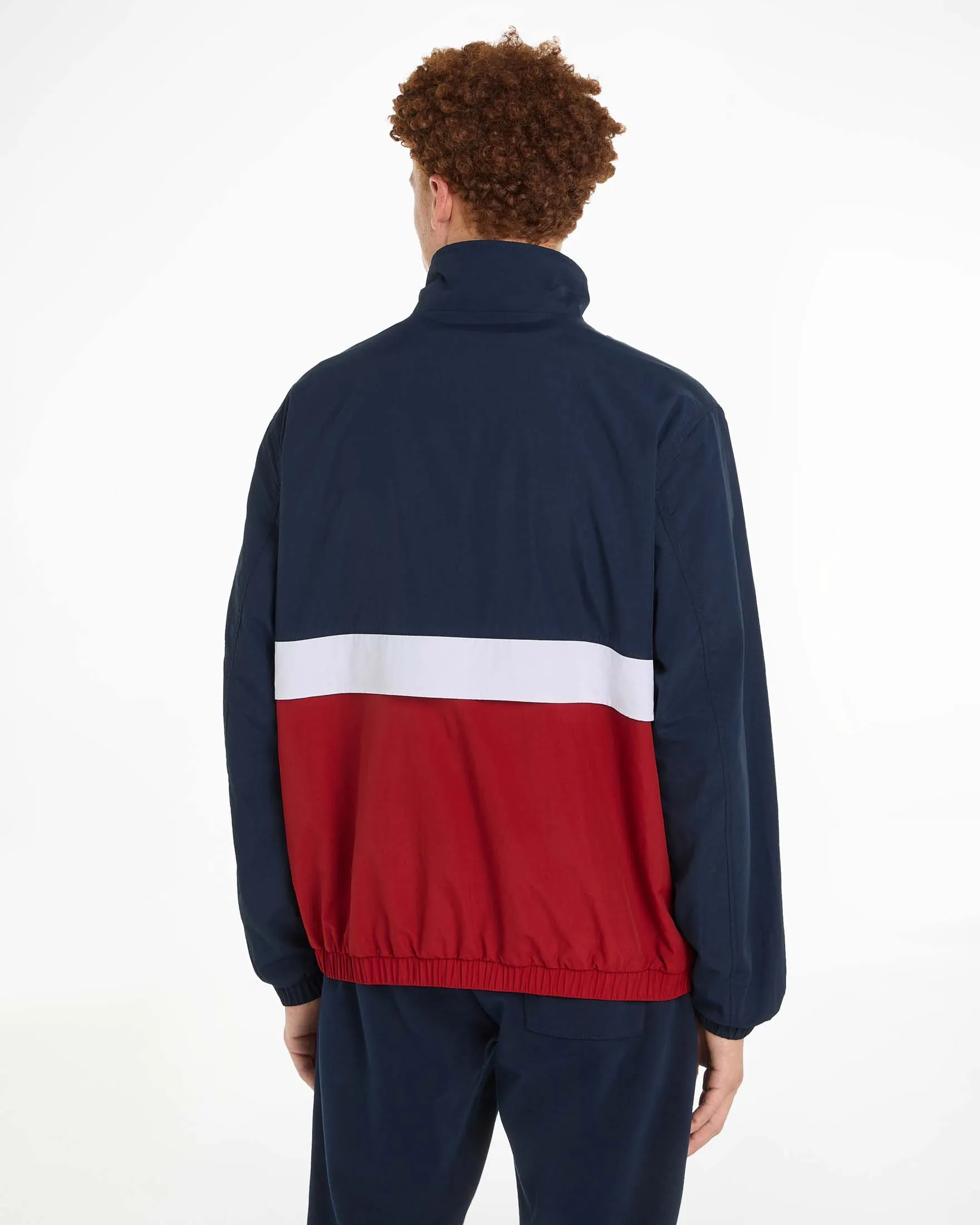 Giubbino antivento color block blu bianco e rosso