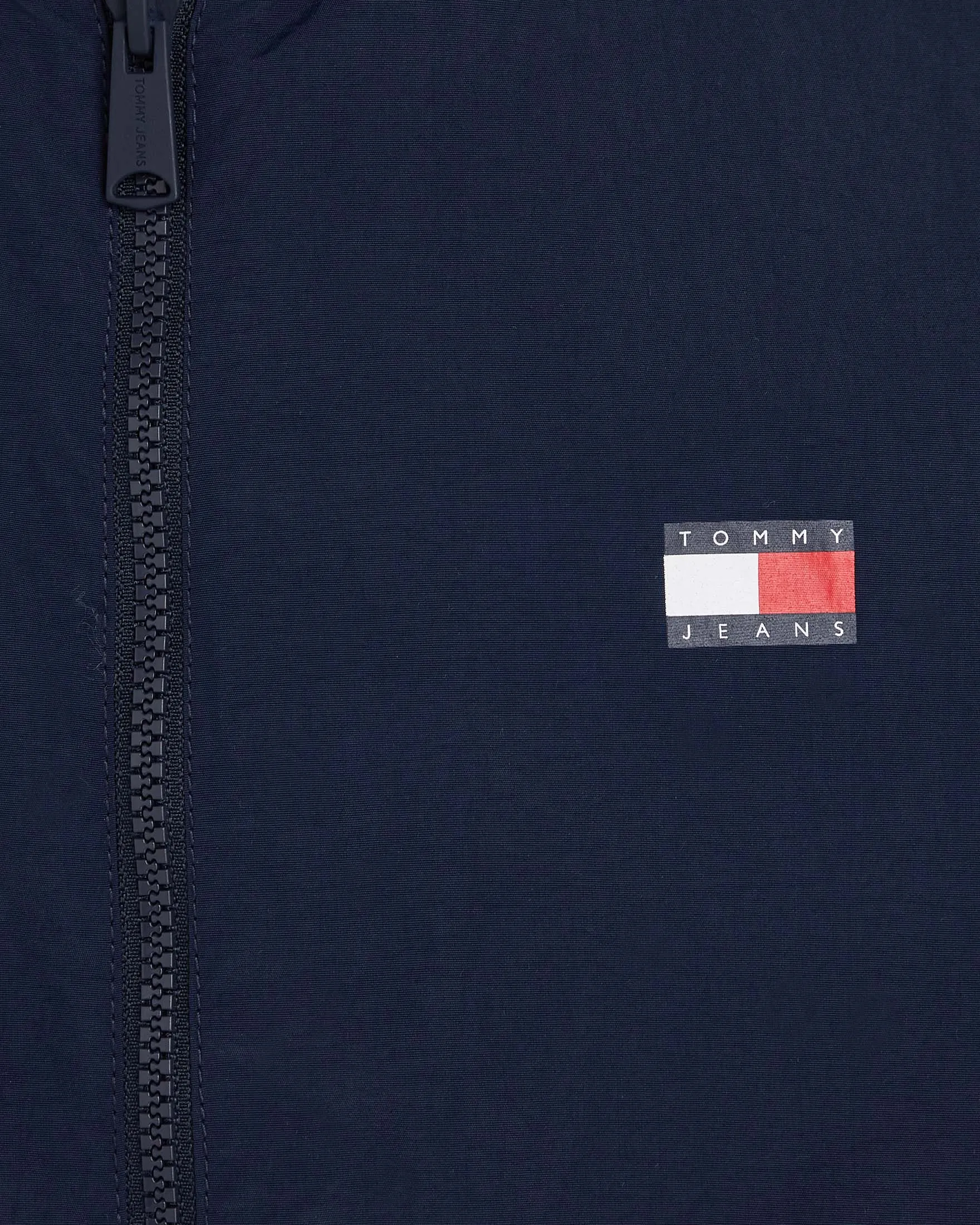 Giubbino antivento color block blu bianco e rosso