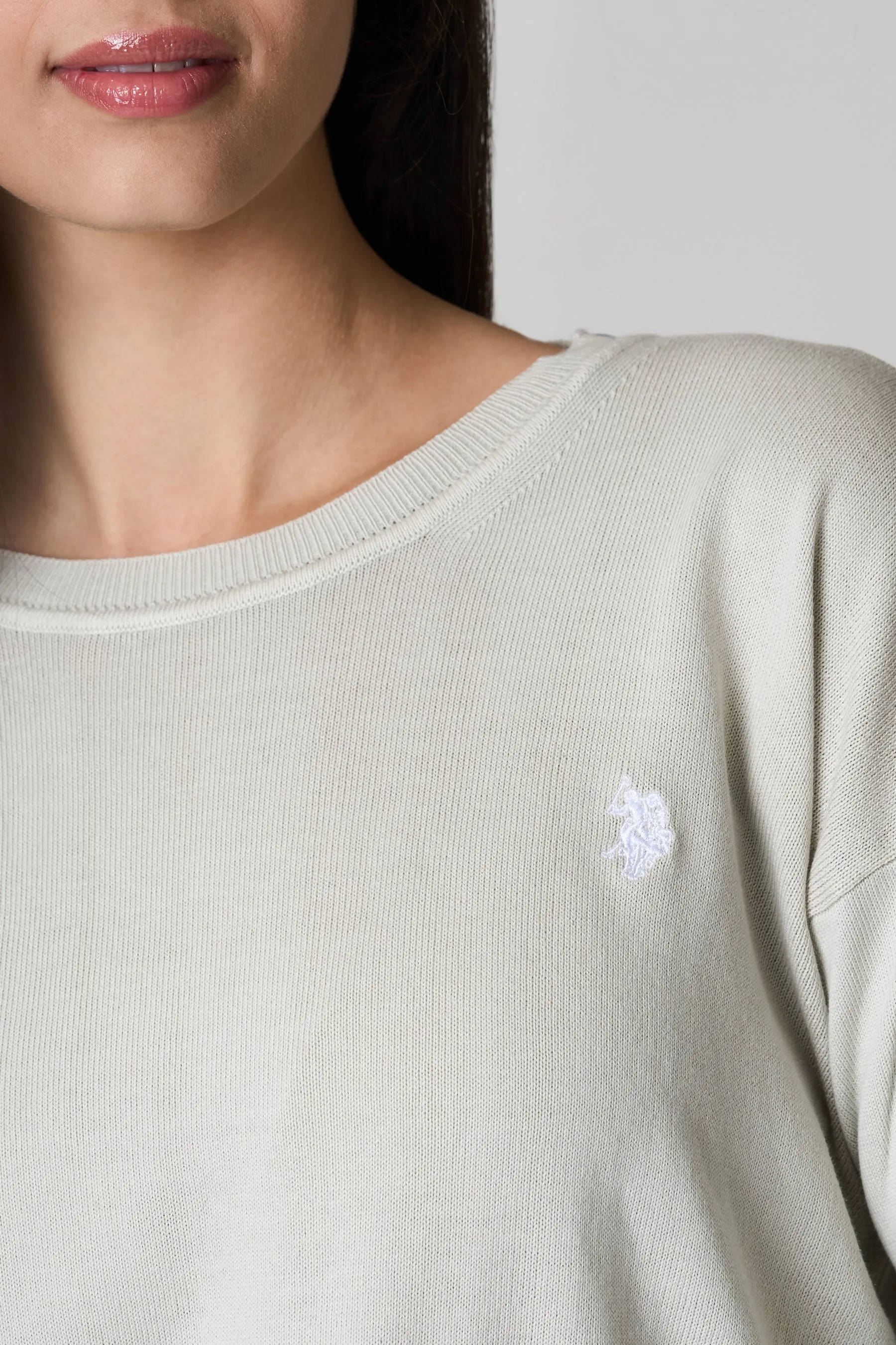 Maglia girocollo in cotone con spacchi laterali e logo