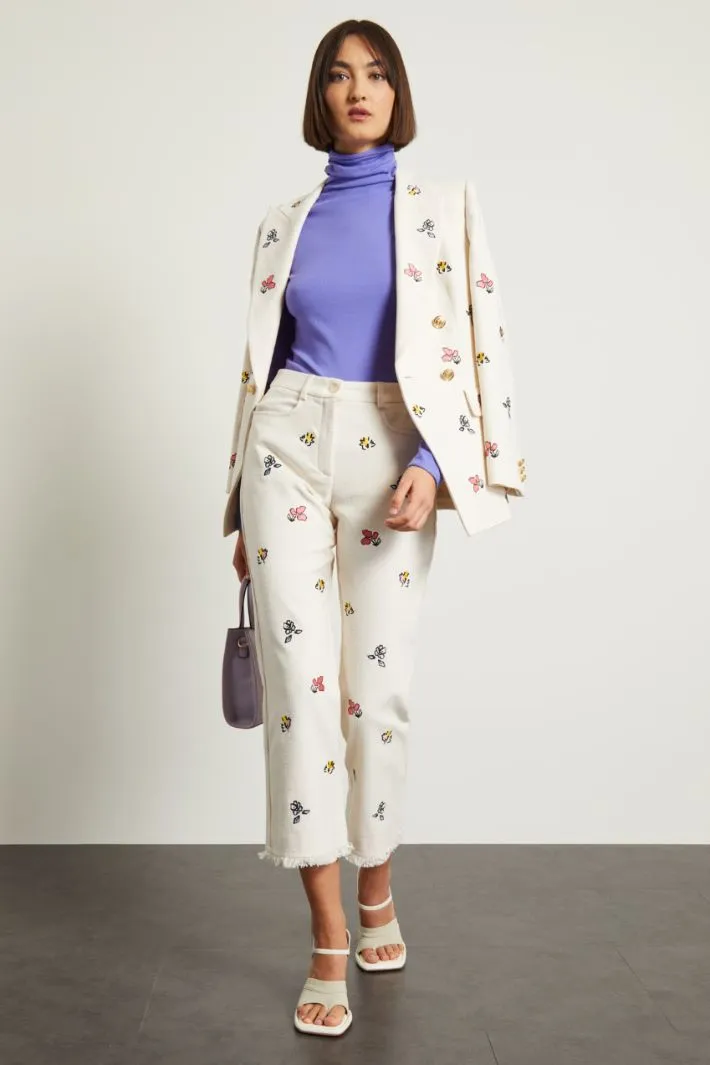 Pantaloni in stuoia ricamati