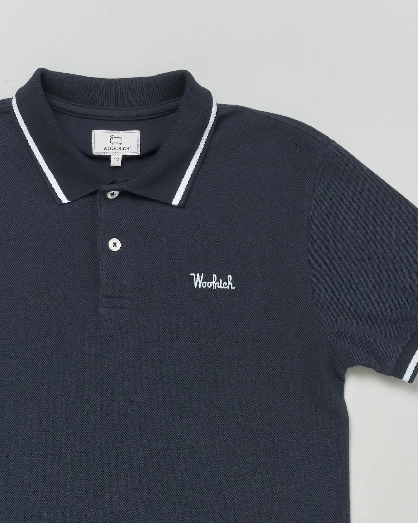 Polo blu in piquet di cotone stretch a maniche corte con bordino bianco 10-16 anni